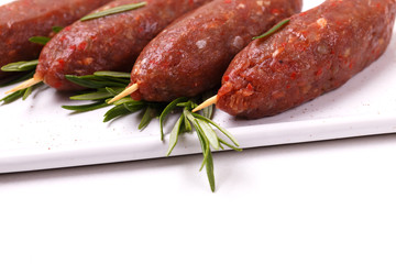 raw lula kebab, lyulya-kebab minced meat. ready to cook with rosemary. Fast food