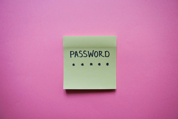 Secret password written on paper note on background. Login access, encryption and cyber security concepts.