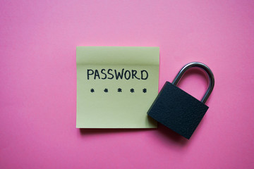 Secret password written on paper note on background. Login access, encryption and cyber security concepts.