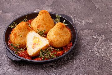 sicilian arancini di riso. risotto rice balls. Coxinha of chicken, Brazilian