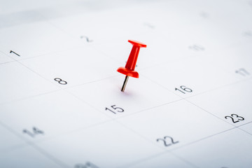 2020 calendar page marked with an important date in red pin. timeline, time, concept, idea,...