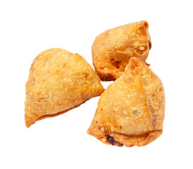 Indian cuisine - three vegetable samosas (fried savoury pastry filled by mash potatoes and vegetables) isolated on white background