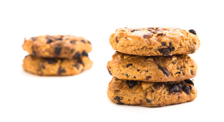 cookies with chocolate and hazelnuts on a white background