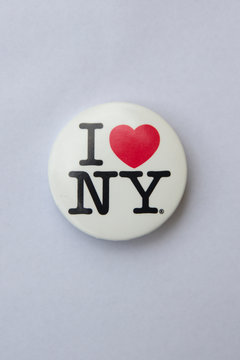 I love NY logo on a badge. This logo basis of an advertising campaign used since 1977 to promote tourism in the state of New York.