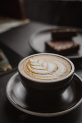 cup of coffee on a black background