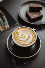 cup of coffee on a black background