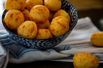Cheese Bread served in a restaurant. 

Brazilian snack cheese bread - Traditional Brazilian food.