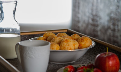 Cheese Bread served in a restaurant. 

Brazilian snack cheese bread - Traditional Brazilian food.