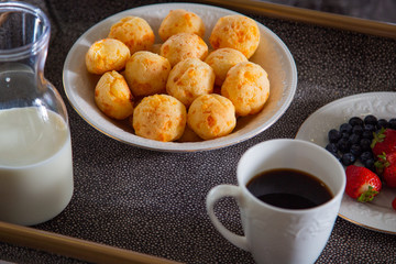 Cheese Bread served in a restaurant. 

Brazilian snack cheese bread - Traditional Brazilian food.