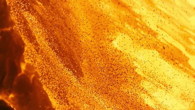 Flowing hot red melted metal. Stock footage. Looking inside an aluminum melting furnace, in a foundry, with liquid and pieces of metal, heavy metallurgy concept.