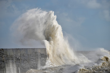 Amzing image of individual wave breaking and cresting during violent windy storm with superb wave detail