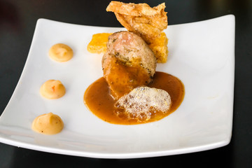 Partridge thigh with fried bread and mustard sauce