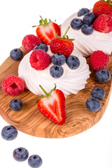 Pavlovas on olive wood board