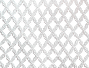 Artificial white crown flower mesh in seamless embroidery patterns isolated on background