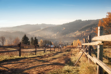 Mountain rural landscape with footpath in the autumn on a sunny day.