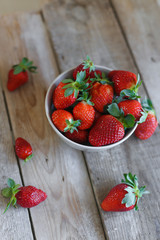 strawberries on a wooden table