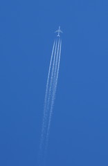 Boeing 747 in flight on blue sky background