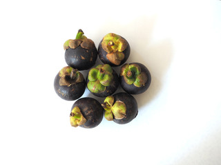 Mangosteen isolate on white background for sale in local market.background, farmer fruit market.