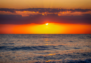 Fototapeta premium sunrise over the sea beach