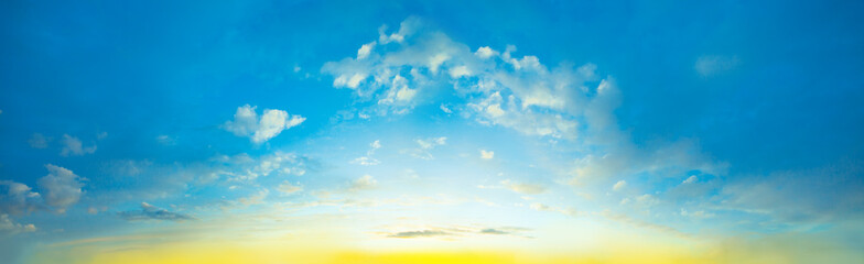 Fototapeta premium Dawn sky. Beautiful landscape with clouds and orange sun on sky