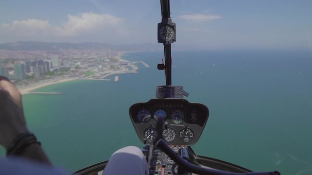 Helicopter Control Panel is not afraid of highs and flies above Barcelona City, Spain HD