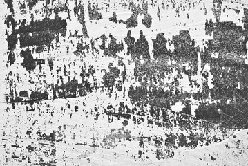 Texture of an old concrete wall with cracks. Black and white wall with dirt and scratches.