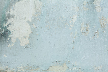 Light blue weathered wall texture. Old Background with crack