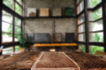 Empty top of wooden shelves on coffee shop ,tree front view background. For product display blur background image, for product display montage.
