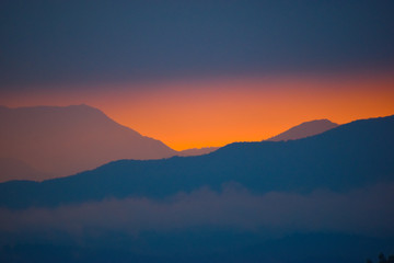 Naklejka na ściany i meble sunrise over the mountains