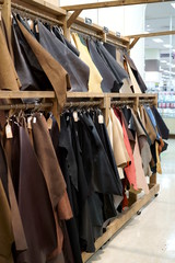 Bokeh image of leather material shelf in craft shop