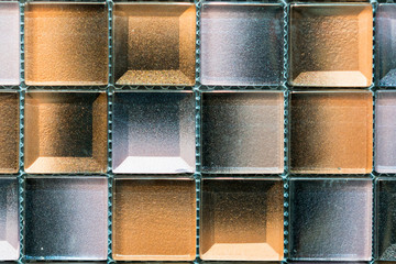 Ceramic mosaic tiles with white and brown embossed squares to decorate the kitchen, bathroom or...