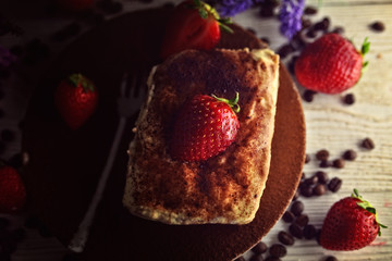 delicious tiramisu dessert with strawberries