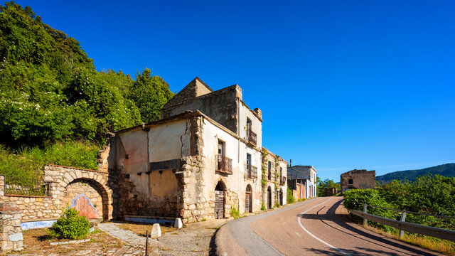 Ruined buildings of an abandoned city. Architecture of a ghost town.