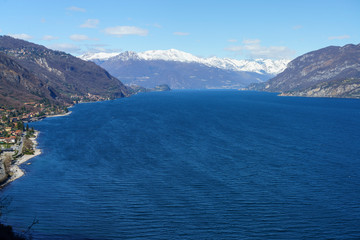 Fototapeta na wymiar Winter landscape near Asso, italy with view of Como lake