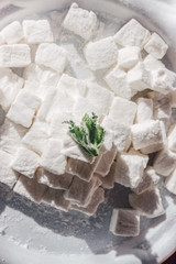 White Homemade Marshmallows with the Mint. Pyramid of Marshmallow. Pile of square Marshmallows.
