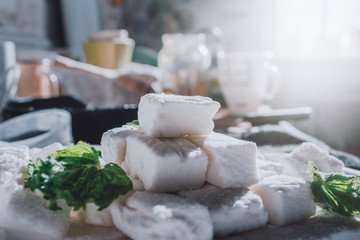 White Homemade Marshmallows with the Mint. Pyramid of Marshmallow. Pile of square Marshmallows.