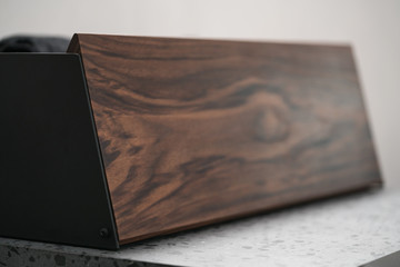 Walnut and black steel bread box closeup
