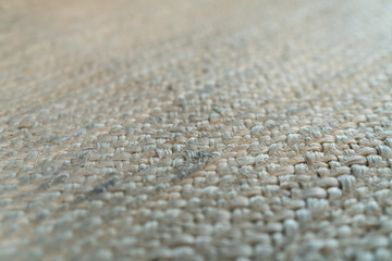 pale jute floor rag background closeup