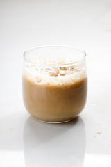 cup of hot coffee on white marble table background.