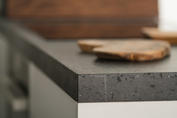 Modern minimalistic kitchen interior with concrete terrazzo countertop