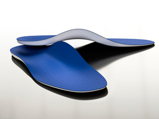 pair of tailored orthopedic insoles