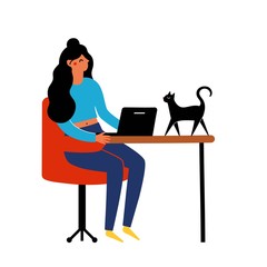 Woman sitting in red chair and working online at home with black cat walking on table.