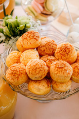 Sweet coconut cookies served on a glass plate. Candy bar concept.