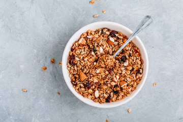 Granola cereals with dried cranberries and almonds for breakfast.