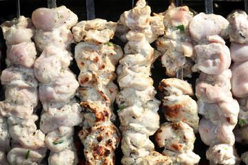 Grilled meat skewers. Barbecue fried on grill. Cooking meat on the coals. Outdoor recreation