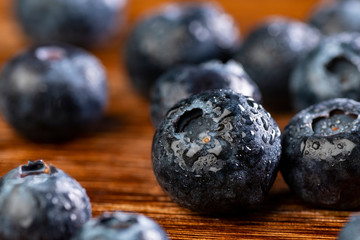Some Blueberry On The Wood Table