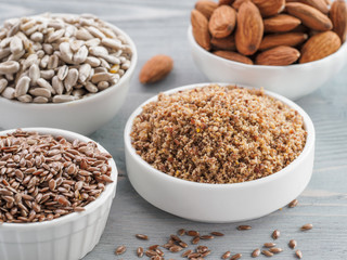 Homemade LSA mix in plate and Linseed or flax seeds, Sunflower seeds and Almonds. Traditional Australian blend of ground, source of dietary fiber, protein, omega fatty acids. Copy space for text.