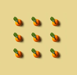 Mandarin pattern isolated on green background. Fresh fruit.