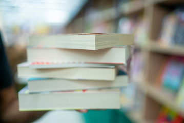 books stacked in the library