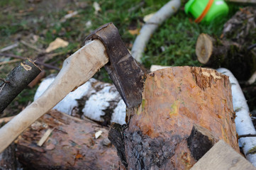 The axe on a log in the village